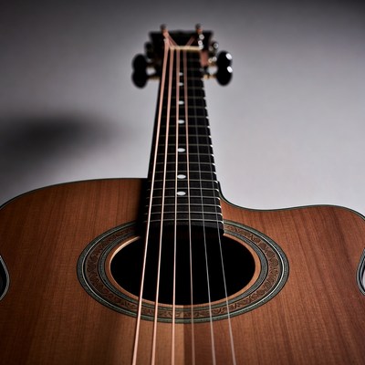 Close view of acoustic guitar strings and body