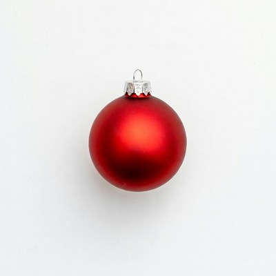 Red christmas ornament on white background