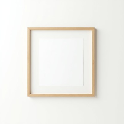 Empty frame on white wall