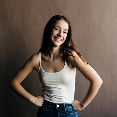 Young woman poses for camera