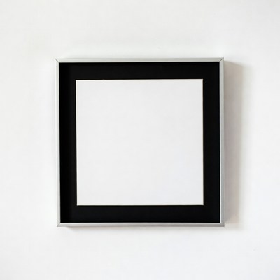 Empty frame on white wall