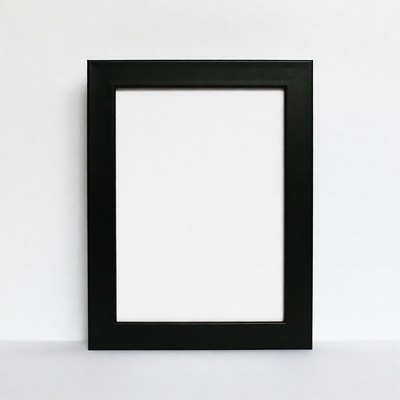 Empty black frame on white wall