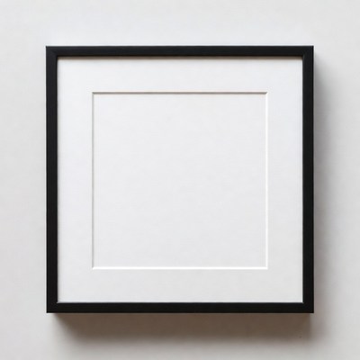 Empty frame on white wall