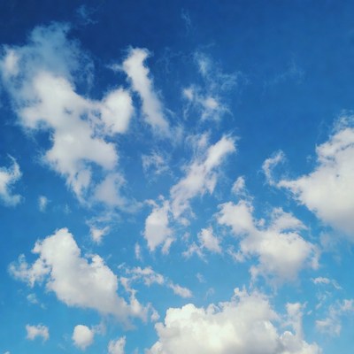 Clouds in a clear blue sky