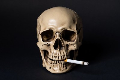 Skull with cigarette in mouth