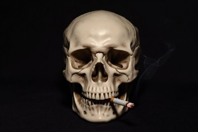 Skull with a cigarette in mouth