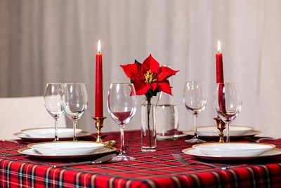 Festive dining setup with candles and flowers