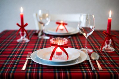 Table setting for holiday dinner with candles
