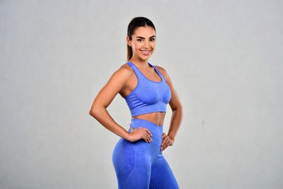 Woman posing in workout clothes
