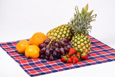 Fresh fruit on checkered cloth
