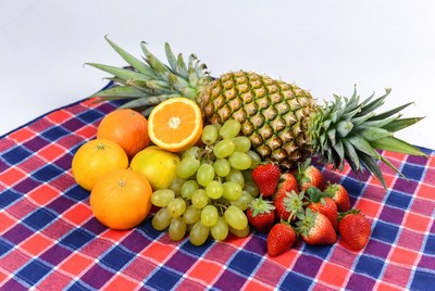 Fresh fruits arranged on cloth