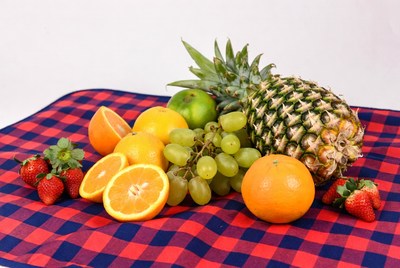 Fresh fruits on a checkered cloth