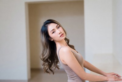 Woman posing in a studio