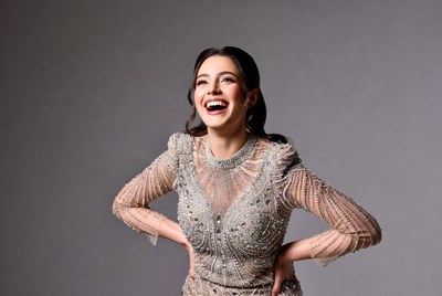Smiling woman in elegant outfit