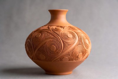 Handmade clay vase with pattern design
