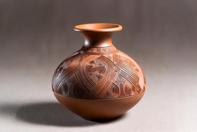 Handcrafted pottery vase with design