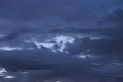 Dark clouds cover the sky