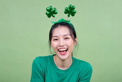 Smiling woman with green headband