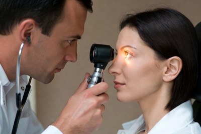Doctor checking patientâ€™s eye health