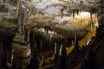 Cave with stone formations and shadows