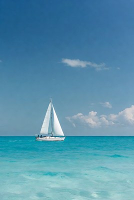 Sailing on clear blue water