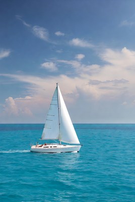Sailboat on the blue ocean