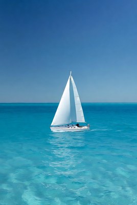 Sailboat on clear blue water