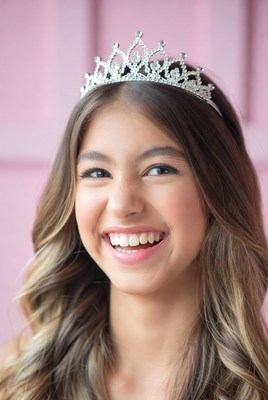 Girl smiling with tiara on head