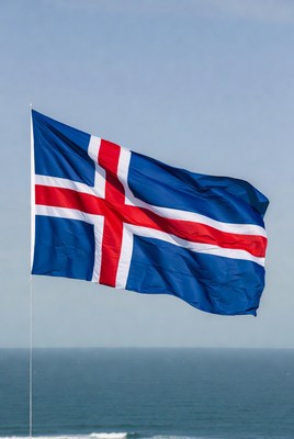 Iceland flag waving by the sea