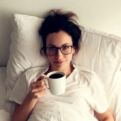 Enjoying coffee in bed
