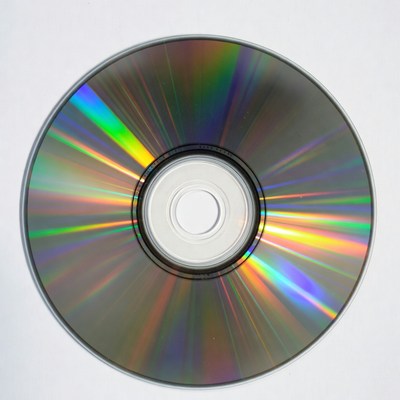 Shiny circular disc with colorful reflections