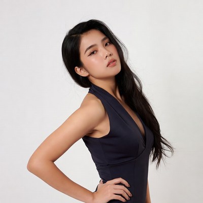 Model poses in studio for a fashion shoot