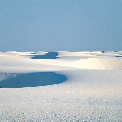 Expansive white sand dunes landscape