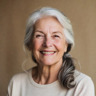 Smiling woman with gray hair