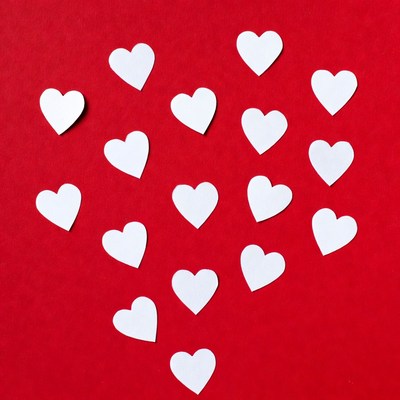 White hearts on red background
