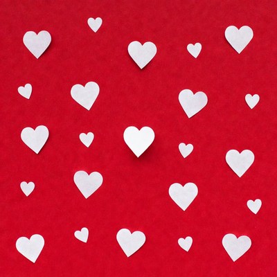 White hearts on red background