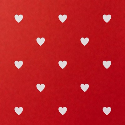 White hearts on red background pattern