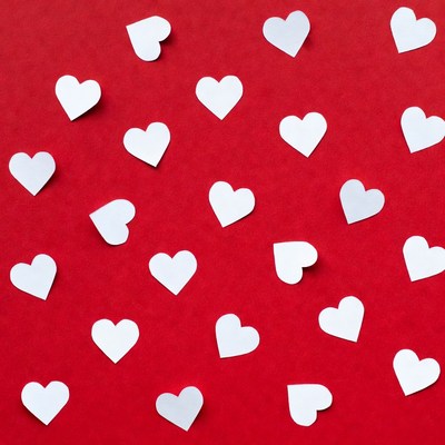 White hearts on red background