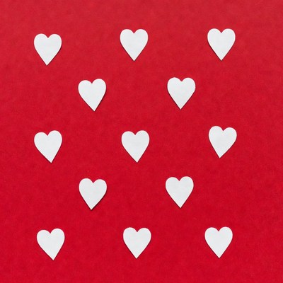 Red background with white heart pattern