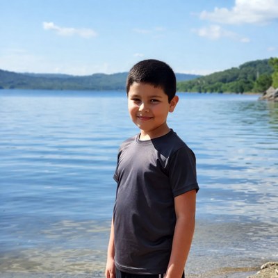 Boy by the lake shore