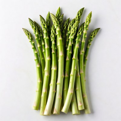 Fresh asparagus spears on white background
