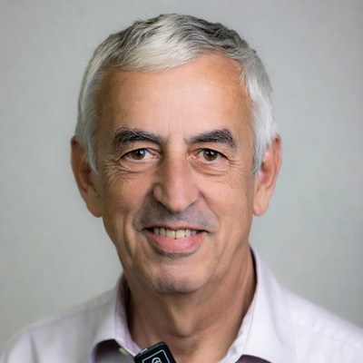 Smiling elderly man with badge