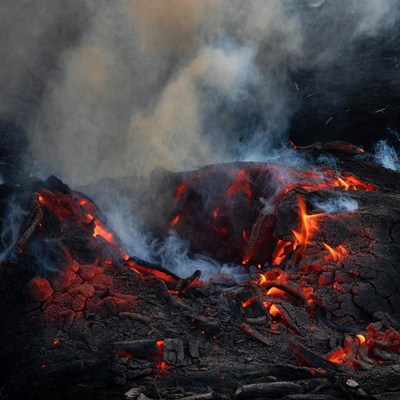 Glowing Lava Flow with Smoke
