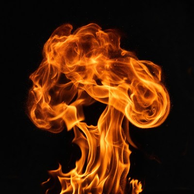 Fiery orange explosion on black background