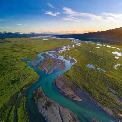 Aerial View of Braided River in Mountains