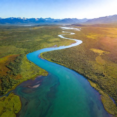 Aerial view of turquoise river in mountains