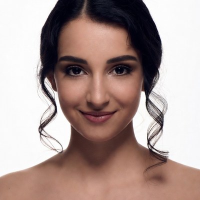 Beautiful woman with dark curly hair