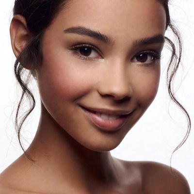 Smiling mixed-race woman close-up