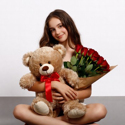 Girl holding teddy bear and roses
