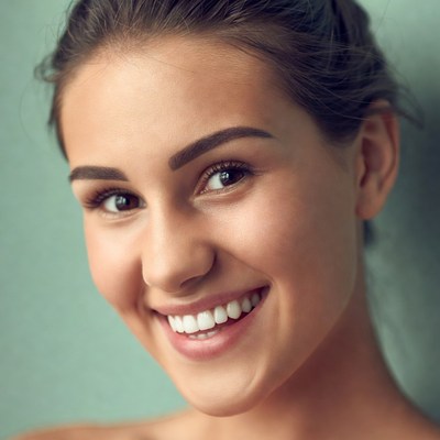 Smiling woman with brown hair